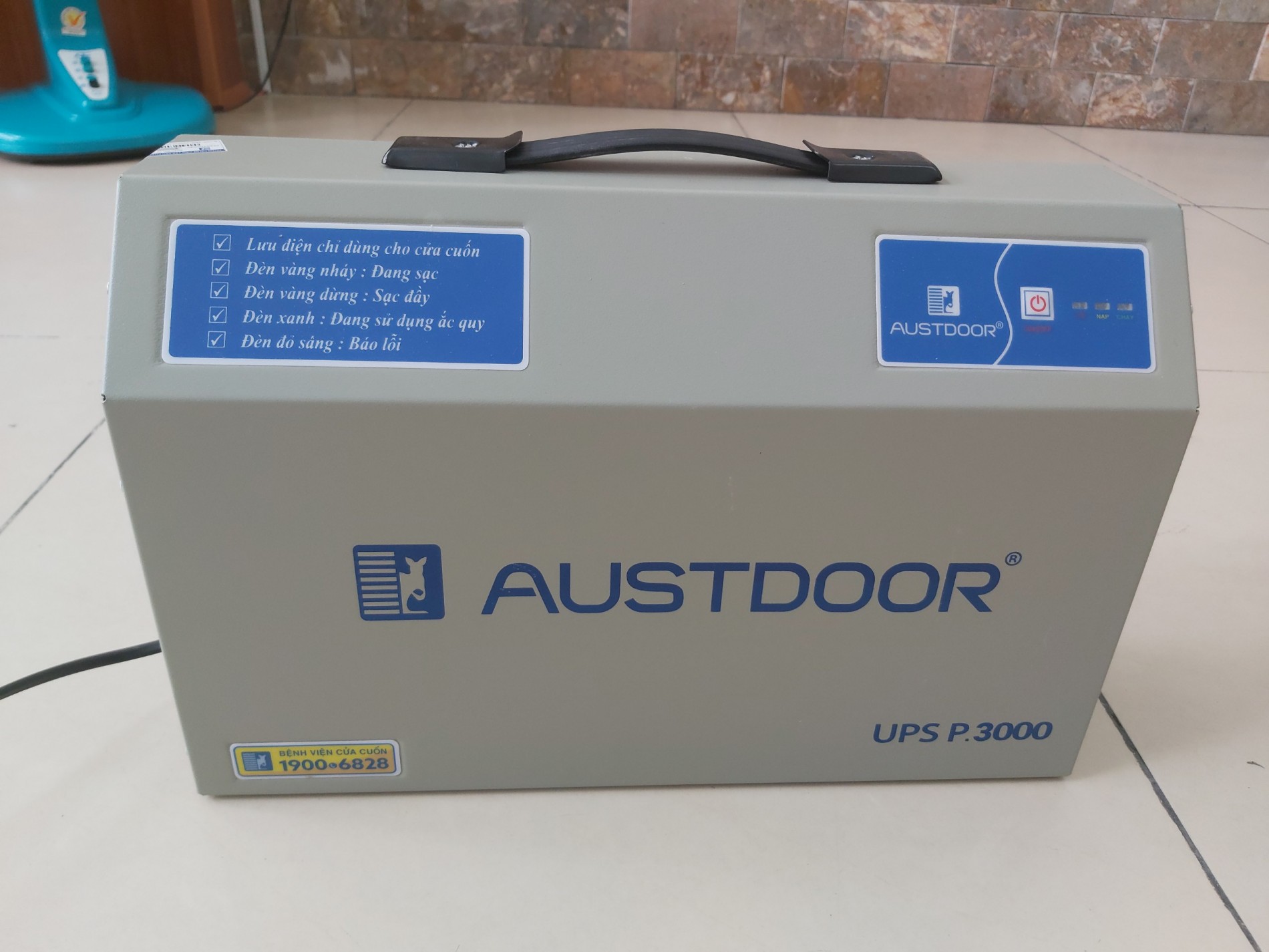 Phụ kiện cửa cuốn tại Quận 7 TPHCM Bình lưu điện, Motor, Remote và Điều khiển qua điện thoại